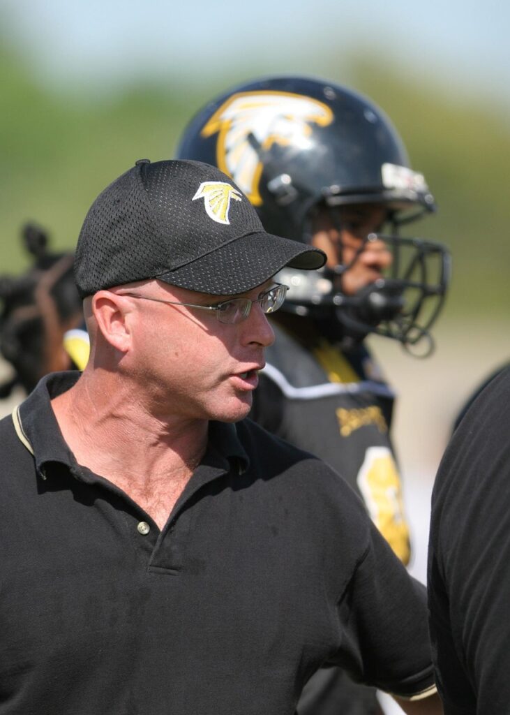coach, football coach, american football coach, high school football coach, team, sport, man, male, outdoors, player, leadership, outside, athlete, football helmet, cap, concentration, leader, stress, focus, tenacity, confidence, texas, texan, coach, football coach, football coach, football coach, football coach, football coach